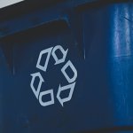 A recycling bin with the three "R" arrows, reduce, re-use, recycle.
