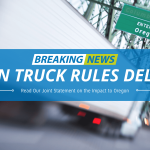 Image of a semi truck entering Oregon on the highway with the words "Breaking News. Clean Truck Rules Delayed. Read Our Joint Statement on the Impact to Oregon."