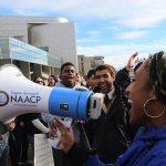 Residents speak at a NAACP event in Eugene, OR